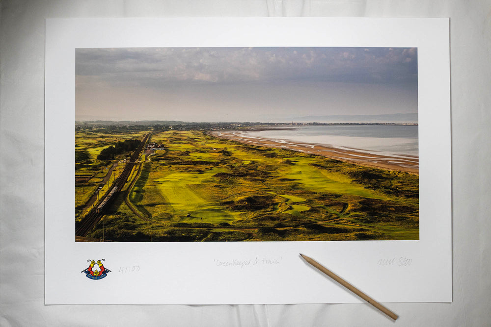 Greenkeeper and train